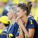 A Michigan fan watches from the front row of the stands in the fourth quarter at Michigan Stadium on Saturday. Melanie Maxwell I AnnArbor.com